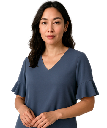 Woman wearing a blue blouse with ruffled sleeves on a white background