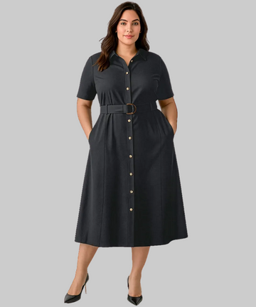 Woman wearing a black dress with buttons on a white background